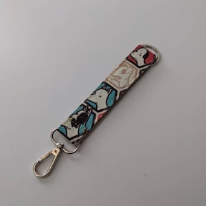 Dogs World Schlüsselanhänger mit Karabiner | entzückende Welpen | Oopsy Auflage | Restposten