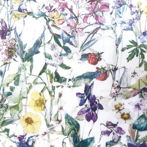 May include: A white fabric with a floral pattern featuring various flowers, leaves, and berries in shades of pink, purple, yellow, and green.