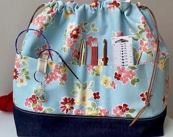 Large Cotton Canvas Spot Print Drawstring Project Bag. 6 front pockets and denim base. Perfect for knitting, crochet, yarn and other crafts.