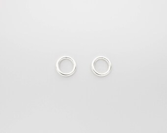 Simple stud earrings with an open circle in a shiny look, recycled sterling silver 18K gold plated