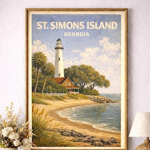May include: Framed art print of St. Simons Island, Georgia, featuring a white lighthouse, a red-roofed house, and a sandy beach. The artwork is set against a blue sky with clouds and palm trees.