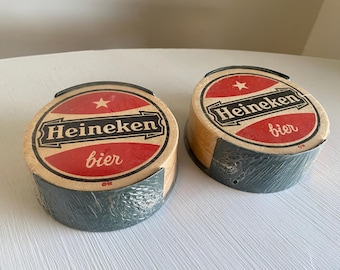 Conjunto vintage de 17 porta-copos Heineken - novos na embalagem original.