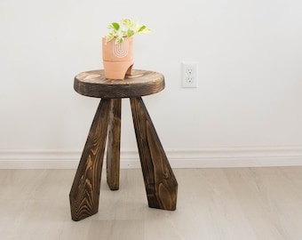 Large footed paddle leg tripod stool. Made from reclaimed wood. Handmade tripod stool with large paddle legs