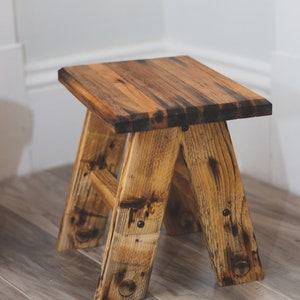 Mixed wooden top plant stand made from recycled lobster trap wood. Reclaimed wooden plant stand