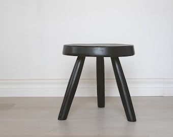 Black berger inspired tripod round stool. Tripod wooden stool handmade from reclaimed wood with pure black finish