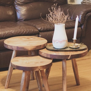 Large variable top reclaimed wooden tripod stool. Tripod round top end table