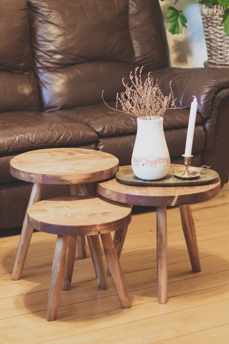 Large variable top reclaimed wooden tripod stool. Tripod round top end table