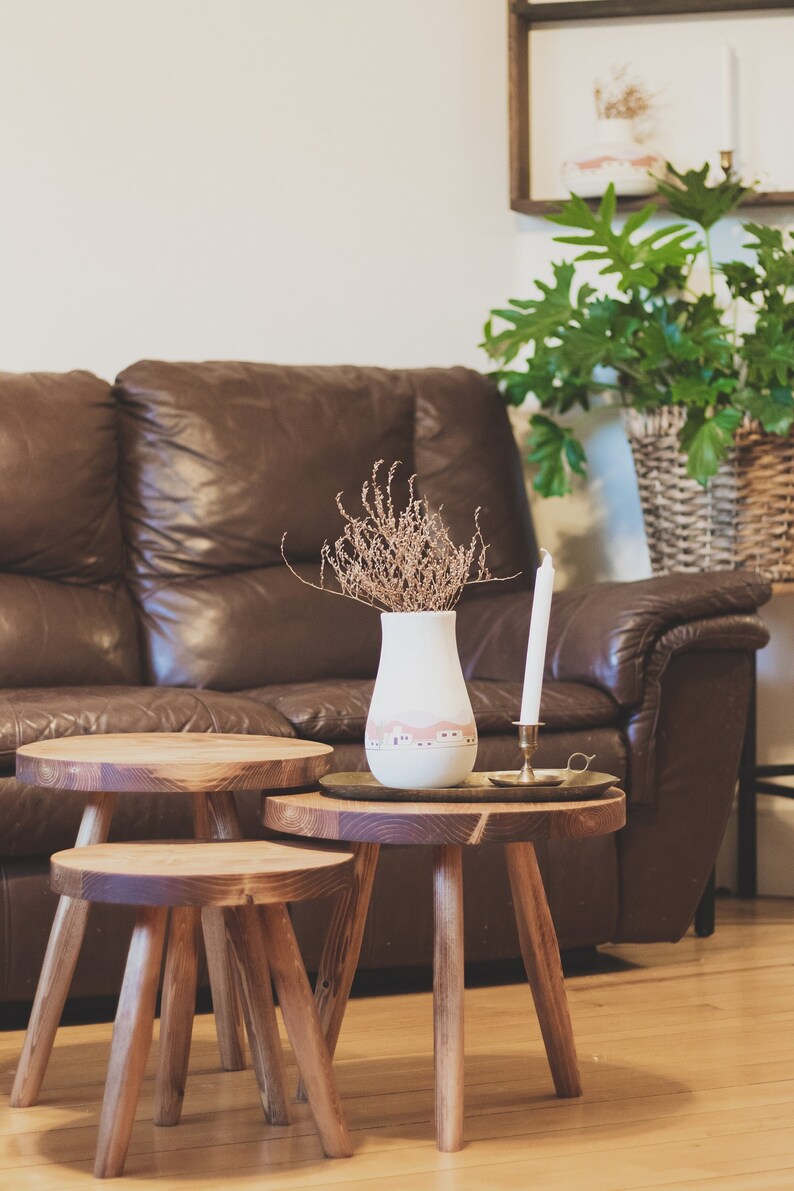 Large variable top reclaimed wooden tripod stool. Tripod round top end table