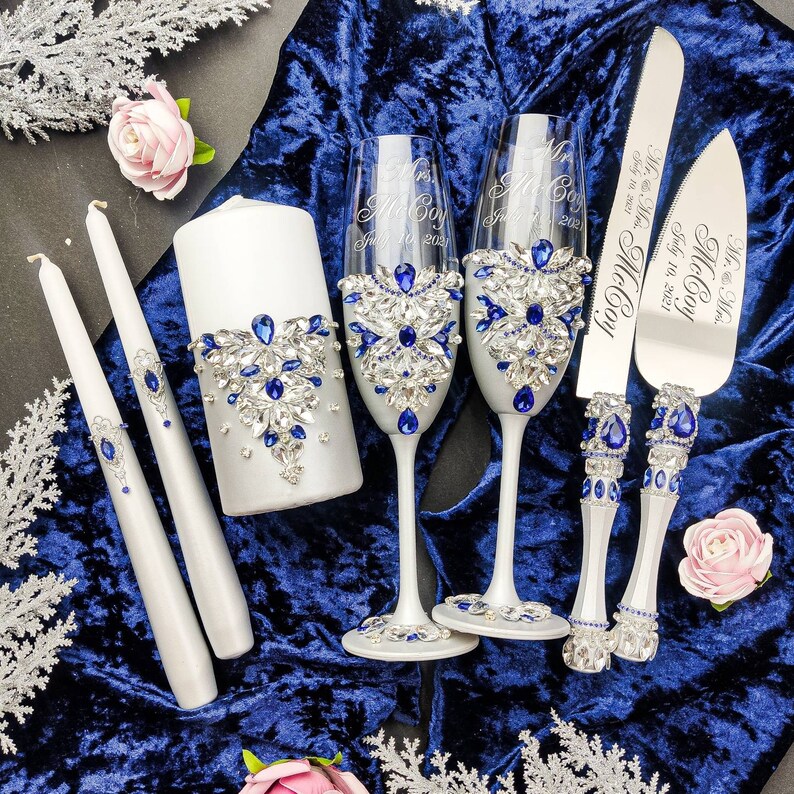 Silver royal blue wedding flutes and cake server sets