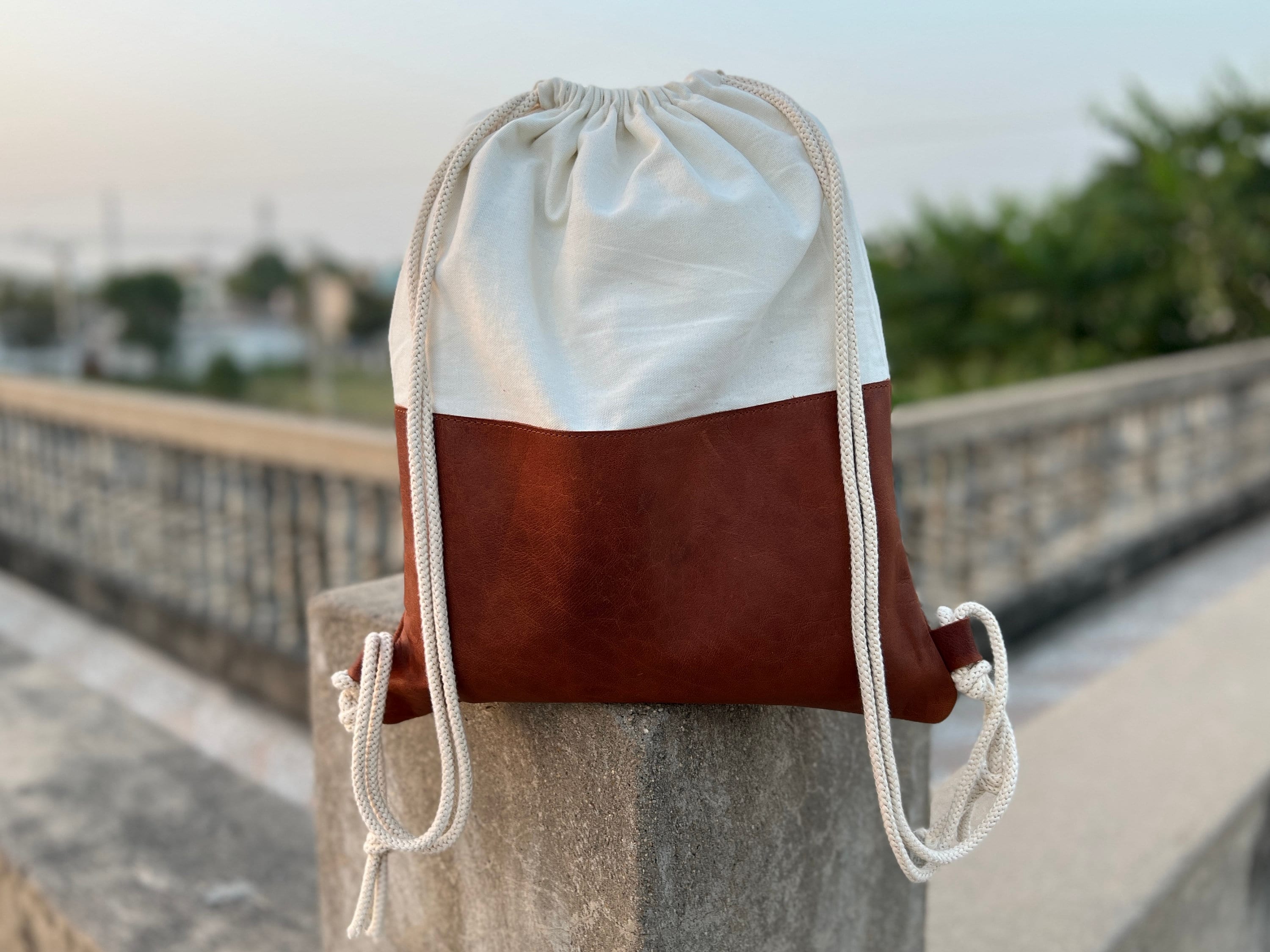 designer leather drawstring backpacks MCM Vintage Small Black Gold Backpack This backpack is so easy to open to grab your essentials Soft Leather Drawstring Backpack -