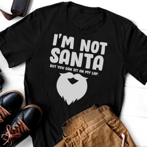 I'm Not Santa But You Can Still Sit On My Lap Christmas T-Shirt, Funny Christmas T-Shirt, Short-Sleeve Unisex T-Shirt