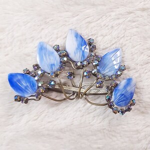 Triad brooch on sale