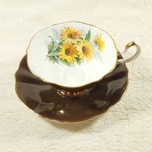 Wide Mouth Queen Anne Chocolate Brown Teacup and saucer with yellow flowers Bone China England