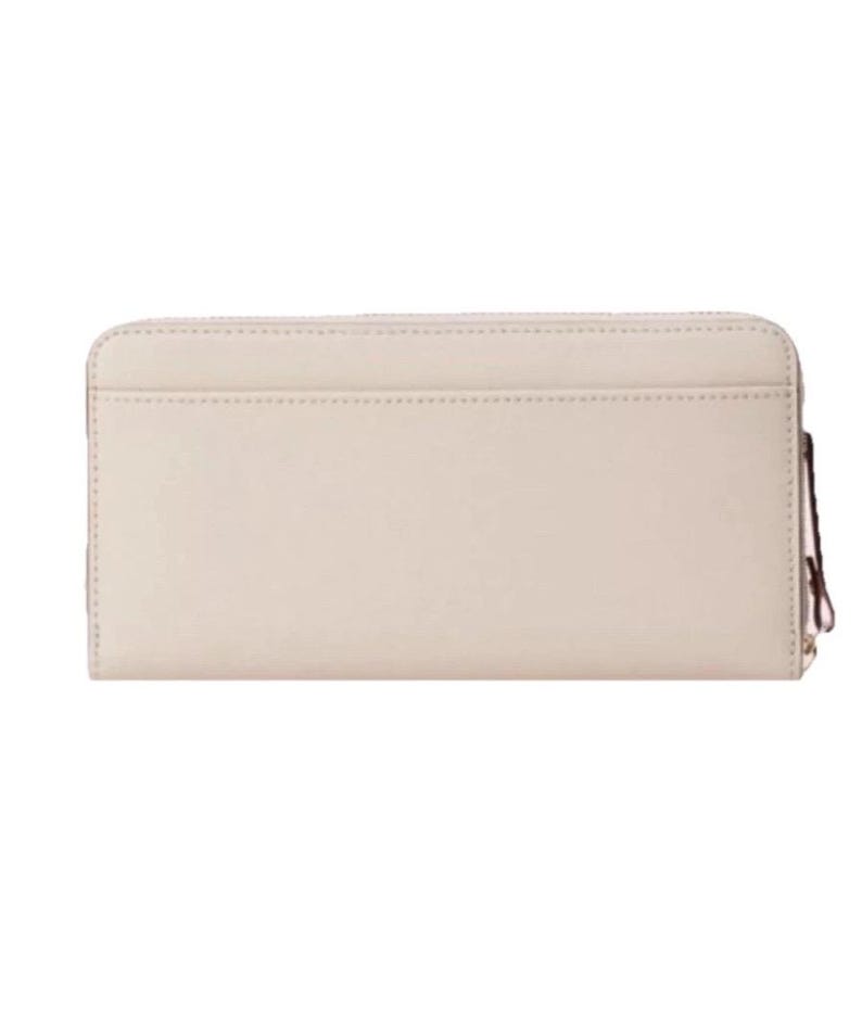 May include: A handmade wooden sign with the text "Welcome to our home" in a handwritten style. The sign is painted white with a distressed finish and features a dark brown border. A small, decorative heart is attached to the bottom.