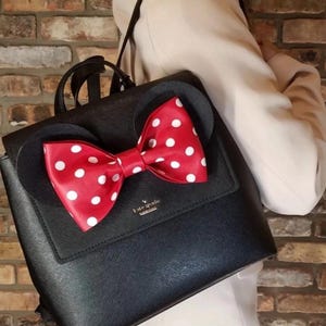 May include: A handmade wooden sign with the text "Welcome to our home" in a handwritten style. The sign is painted white with black lettering and a distressed finish, perfect for home decor.