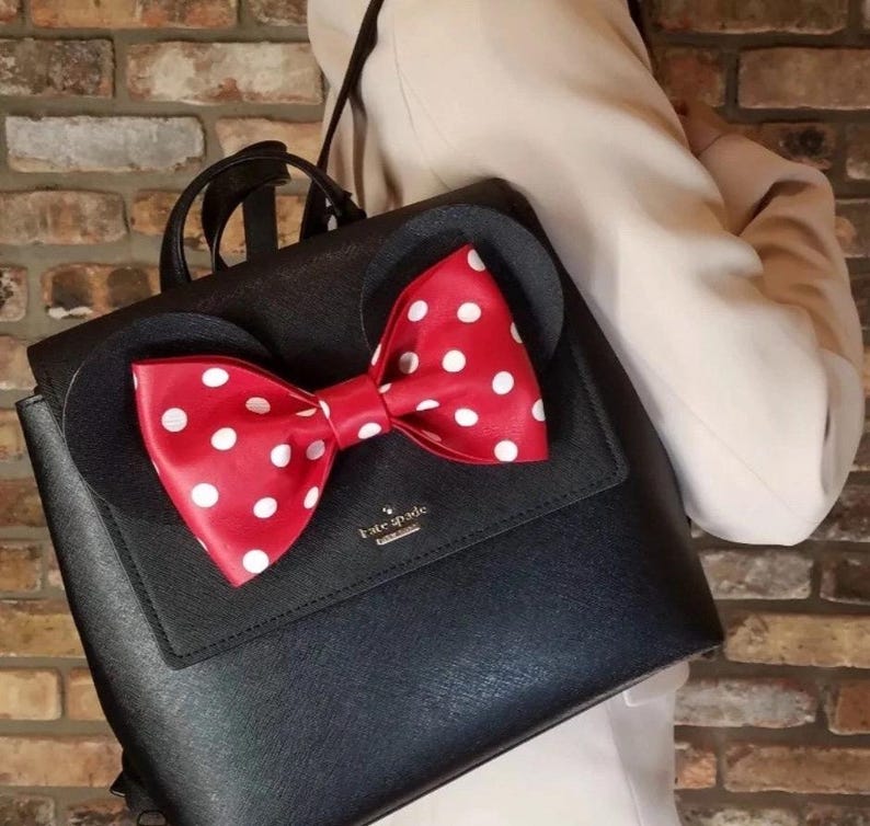 May include: A handmade wooden sign with the text "Welcome to our home" in a handwritten style. The sign is painted white with black lettering and a distressed finish, perfect for home decor.