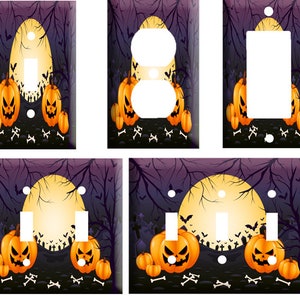 May include: Set of four Halloween light switch covers featuring a spooky scene with jack-o'-lanterns, bats, and a full moon. The covers are available in single, double, and triple switch configurations.
