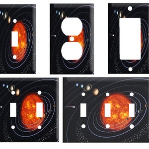 May include: A set of four light switch covers featuring a stylized image of the solar system with planets orbiting a bright orange sun. The switch covers are available in single, double, and triple switch configurations.