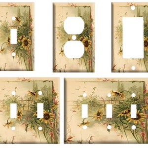 May include: Set of six light switch and outlet covers featuring a vintage illustration of sunflowers in a garden. The covers are in a cream color with a light brown border.
