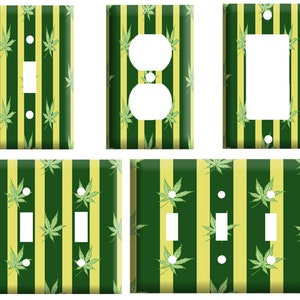 May include: Set of four light switch and outlet covers featuring a green and yellow striped pattern with a green marijuana leaf design.
