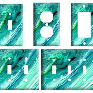 May include: Set of six light switch and outlet covers featuring a teal, green, and white abstract marbled design.