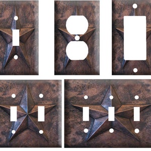 May include: Set of four rustic copper-colored light switch and outlet covers featuring a five-pointed star design. The covers are made of durable plastic and are easy to install.