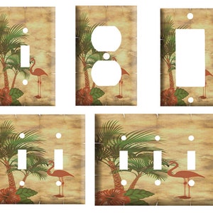 May include: Set of four light switch and outlet covers featuring a tropical design with palm trees, pink flamingos, and hibiscus flowers. The covers are made of durable plastic and are easy to install.