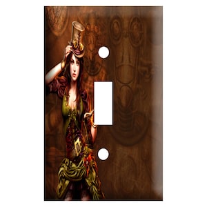 May include: A light switch cover featuring a steampunk-inspired illustration of a woman wearing a top hat and goggles, with a brown and gold background.