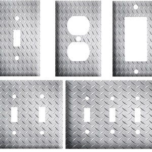 May include: Set of six silver metal light switch and outlet covers with a diamond plate pattern.