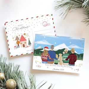 May include: A Christmas card featuring a family of five standing in front of a snowy mountain range. The family is wearing winter clothing and the dog is wearing a red sweater. The text on the card reads "Amanda, Papa, Annalise, Rocket, Harry, Nana & Harry Christmas 2024".