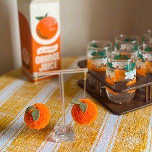 Jumbo Orange Pom Poms