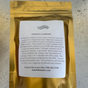 May include: A gold foil pouch with a white label featuring the text "PARASITE CLEANSER." The label lists ingredients like Black Walnut Hull, Cloves, and Wormwood. The product is described as a formula to cleanse the body of parasites. Contact information is included.