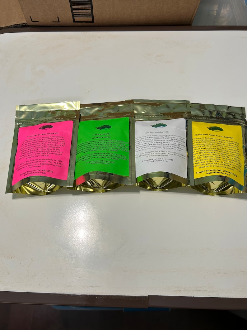 May include: Four foil pouches with colorful labels. The labels are pink, green, white, and yellow, each with text. The pouches are labeled "Alkaline Blood Cleanser", "Intracellular Cleanser", "Lymphatic Cleanser", and "Detox Gut and Cell Cleanser".
