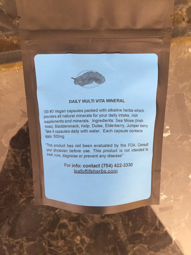 May include: Blue and white label with the text "DAILY MULTI VITA MINERAL" and information about vegan capsules packed with alkaline herbs. The label also includes the text "leafoflifeherbs.com" and a phone number.