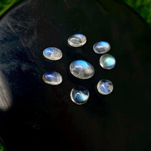 Rainbow Moonstone Cabochons: 5.60 Carats, Oval Blue Flash Gemstones, Lot of 8
