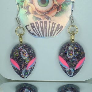 Alien head earrings glowing eyes