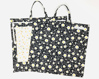 Medium size- Daisies in black fabric clear vinyl project bag approximately 14-1/2”x 15-1/2”