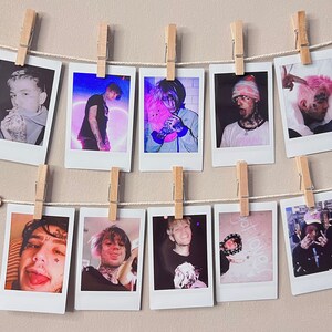 May include: A wall display of ten Polaroid photos featuring a young man with various hairstyles and clothing. The photos are hung on a string with clothespins.
