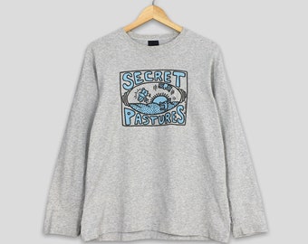 Camiseta vintage de Keith Haring de los años 90 con diseño pop art de Secret Pastures, talla mediana. Camiseta gris de manga larga con diseño de Keith Haring de Secret Pastures, talla M.