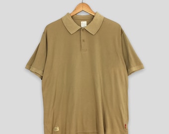 Camisa polo vintage Wtaps Japan lisa cáqui tamanho G. Camisa polo Wtaps lisa japonesa streetwear. Camisa polo Wtaps Hyterics Bounty Hunter tamanho G.