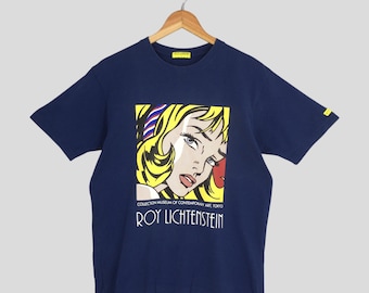 Camiseta vintage de Roy Lichtenstein con la ilustración de "Chica con cinta para el pelo", tamaño grande. Camiseta de Roy Lichtenstein con la ilustración de "Chica ahogándose" del artista de Lichtenstein, talla L.