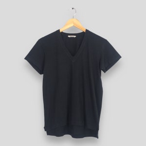Camiseta minimalista negra con cuello en V de diseñador japonés Auralee, talla 1