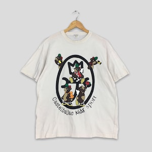 Vintage 1990s Castelbajac Dziecięca Sportowa Koszulka Średnia Jean Charles Castelbajac Włochy Pop Art Bear Cartoons Artwork Białe Koszulki Rozmiar M