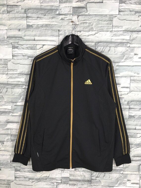 black jacket with yellow stripes