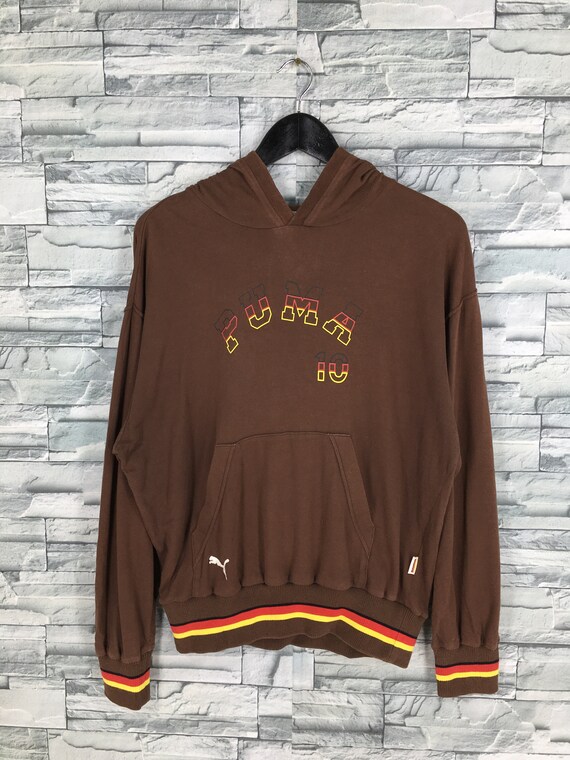 brown puma shirt