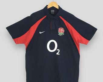 vintage nike rugby rose logo O2 black polo large | eBay
