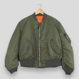 Chaqueta bomber MA-1 Alpha Industries de los años 90, estilo vintage, de la Fuerza Aérea de EE. UU., talla grande. Chaqueta de vuelo USAF Alpha USAFA militar reversible con cremallera, color oliva.