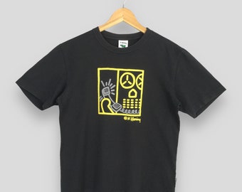 Camiseta negra vintage de los 90 con estampado de teléfono de Keith Haring, estilo pop art, litografías de teléfonos, talla M. Arte de K. Haring, ropa urbana, camisetas con diseños artísticos.