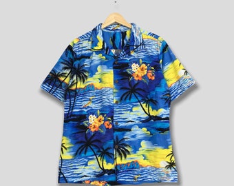 Camisa hawaiana vintage con estampado de palmeras Aloha, talla mediana. Estilo vintage de los 70, con estampado tropical de hibisco hawaiano, ideal para la playa o el surf. Fabricada en poliéster con botones.