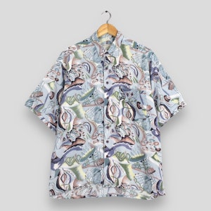 Camisa de verano hawaiana psicodélica vintage de los 90, talla L, con estampado abstracto multicolor de olas oceánicas de Hawái. Camisa de rayón con botones.